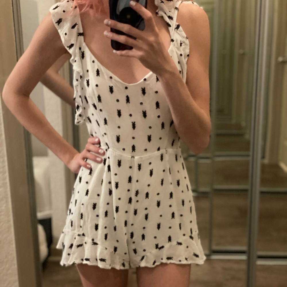 White romper with black arrow pattern